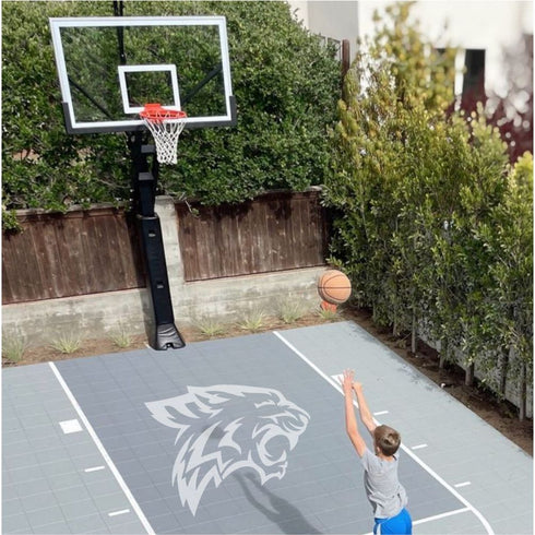 Wildcats Mascot stencil on a basketball court.